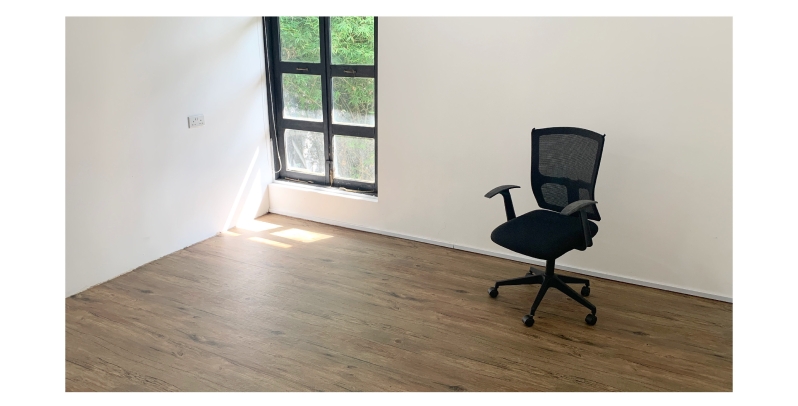 a tidy room with a glamorous wood flooring 